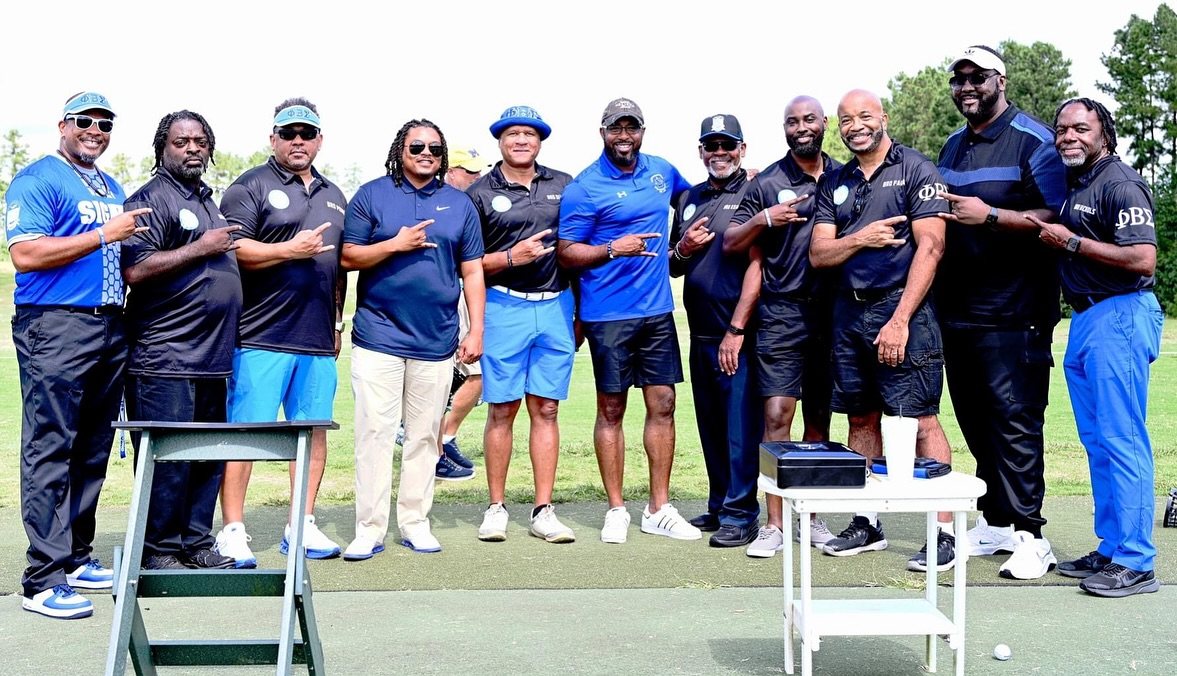 Phi Beta Sigma Upsilon Chi Sigma brothers at the golf tournament
